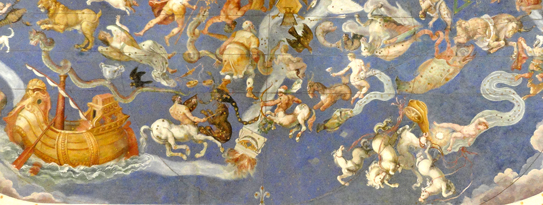 Palazzo Farnese di Caprarola. La Sala del Mappamondo. La volta celeste cosparsa di stelle dorate, con cinquantun costellazioni rappresentate con figure mitologiche, con la via lattea che viene alimentat dalle fiamme dell'altare rovesciato. Sulla sinistra la nave Argo, qui simbolo Farnesiano, che affronta l'oceano dei pericoli che minacciano la casata. Sulla destra la caduta di Fetonte. Il globo celeste viene rappresentato con le stesse coordinate utilizzate per il planisfero, la proiezione della sfera su piano avviene sull'asse del solstizio invernale che taglia a metà in senso verticale tutto l'affresco. La linea della sinusoide indica il movimento del sole durante l'anno. Il Giglio Farnesiano, simbolo del potere della casata, portato sulle vette della Chiesa e proiettato in una dimensione universale.